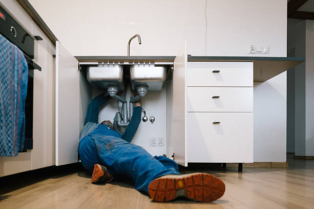 Professional Emergency Plumber technician working in Millville, DE